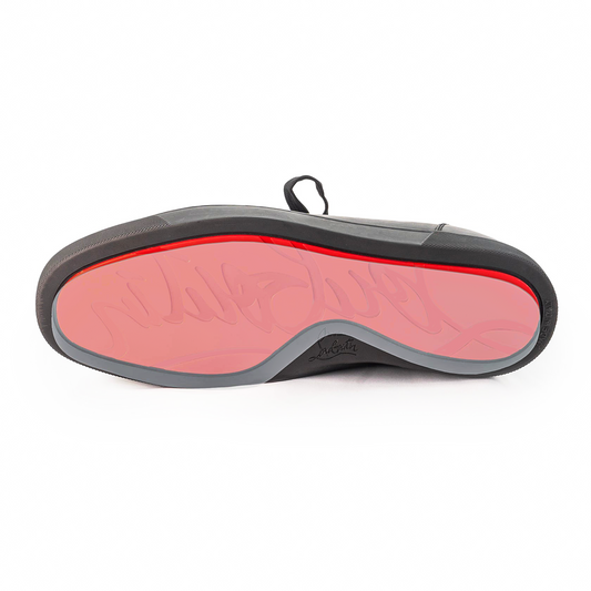 The Christian Louboutin Sneaker Sole Guard is perfect for protecting the iconic black sneaker’s bright red translucent sole and vinyl polymer finish, helping preserve the signature design when viewed from below.
