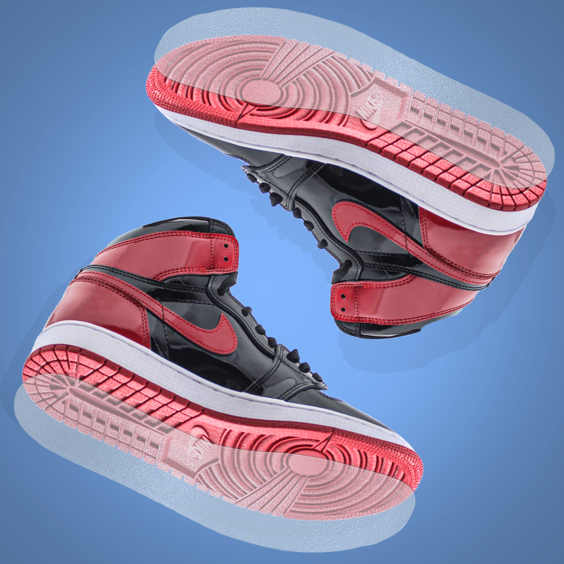 Two black and red high-top sneakers with white soles float on a blue background, highlighting the Sole Guard Jordan 1 Traction Sole Guard 3 Pack for premium sneaker protection and lasting style.