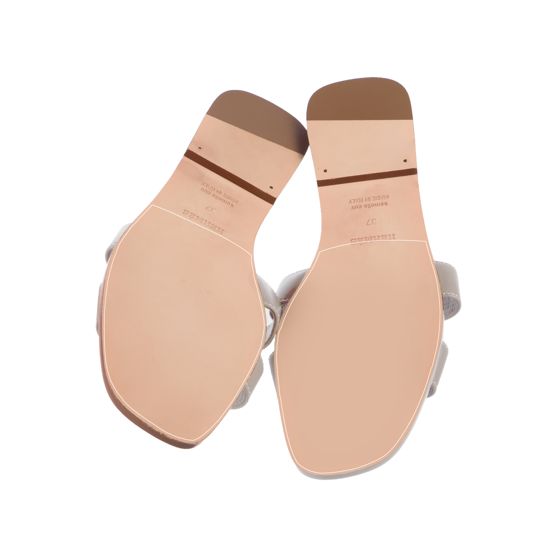 The Hermès Oran Sandal Sole Guard 3 Pack features beige leather soles with visible stitching and a discreet brand logo on one, echoing the style of the original sandals.