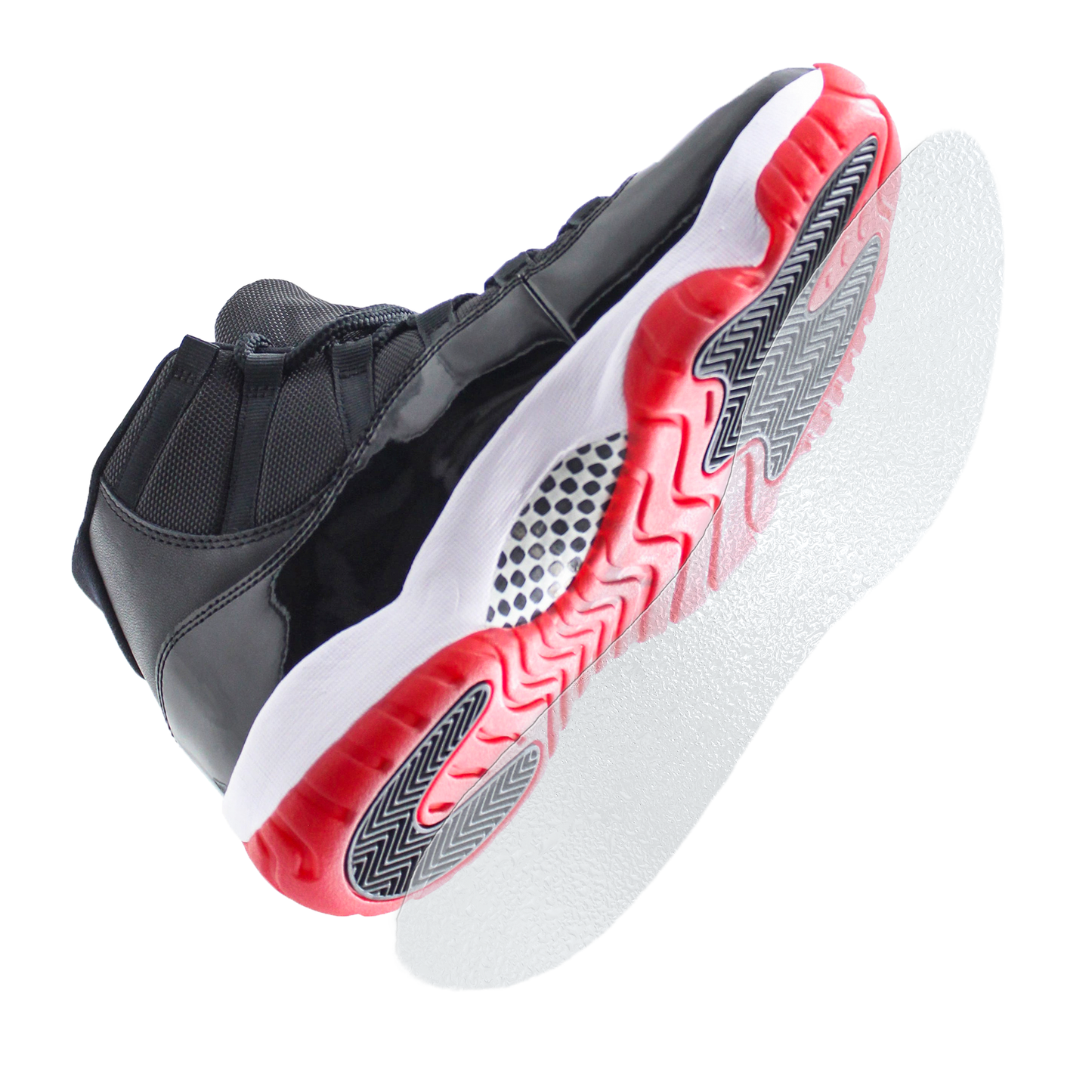 The Sole Guard Jordan 11 Traction Sole Guard 3 Pack features black and red sneaker protectors with a translucent sole, designed for added durability and viewed from a low angle to highlight their traction-enhancing benefits.