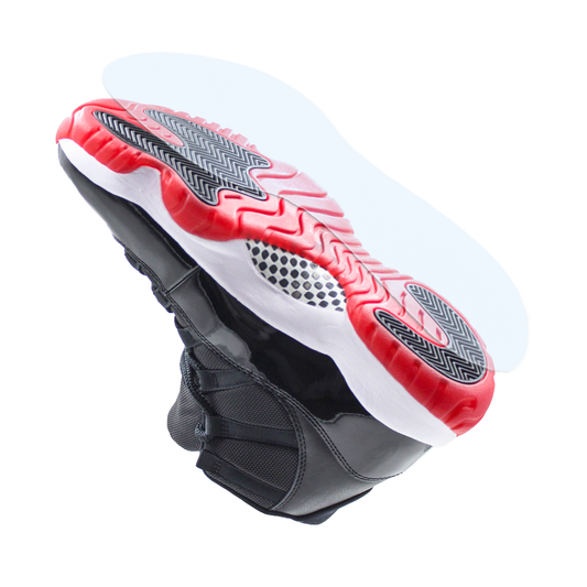 Sleek black sneaker with a glossy look, shown from the sole, features red and white wave-patterned tread—perfect for Jordan 11 fans seeking protection and preservation with the Jordan 11 Sole Guard.