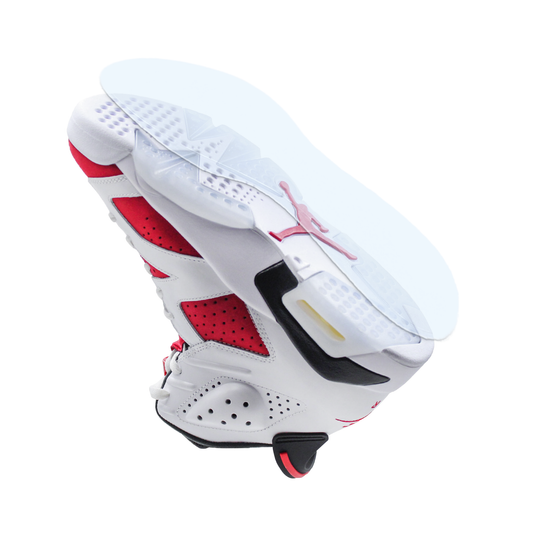 The Jordan 6 Sole Guard, a white and red athletic sneaker, is shown from below highlighting its detailed sole with added Sole Guard protection on a white background.