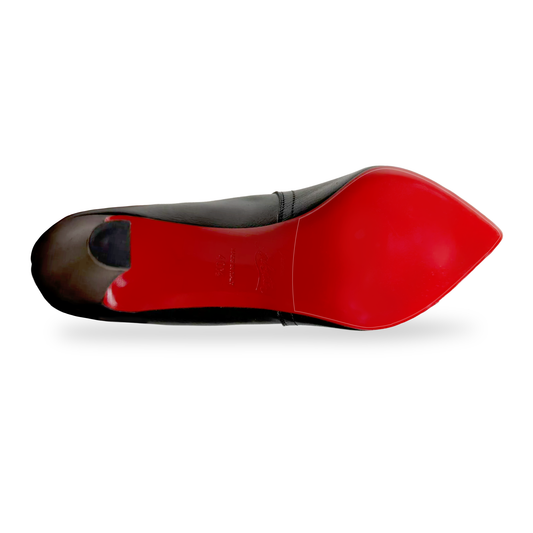 A black high-heeled shoe with a glossy red sole, similar to Christian Louboutin Pointed Toe Boots Sole Guard 3x Pack, viewed from the bottom.