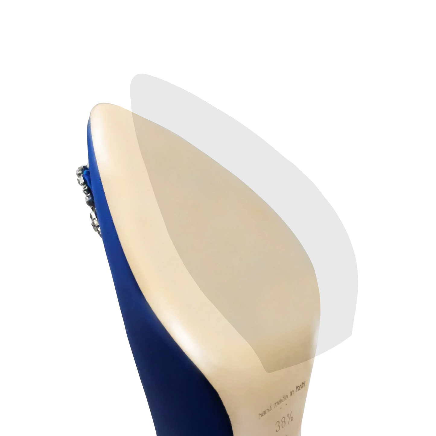 The blue high heel shoe with a beige sole and bejeweled embellishment on the back is reminiscent of classic Manolo Blahnik heels, similar to the style seen in the Manolo Blahnik Sole Guard 3 Pack.