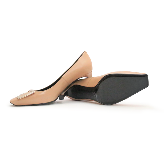Beige high-heeled shoes with black soles elegantly feature Roger Vivier Sole Guard; one is upright while the other lies on its side.