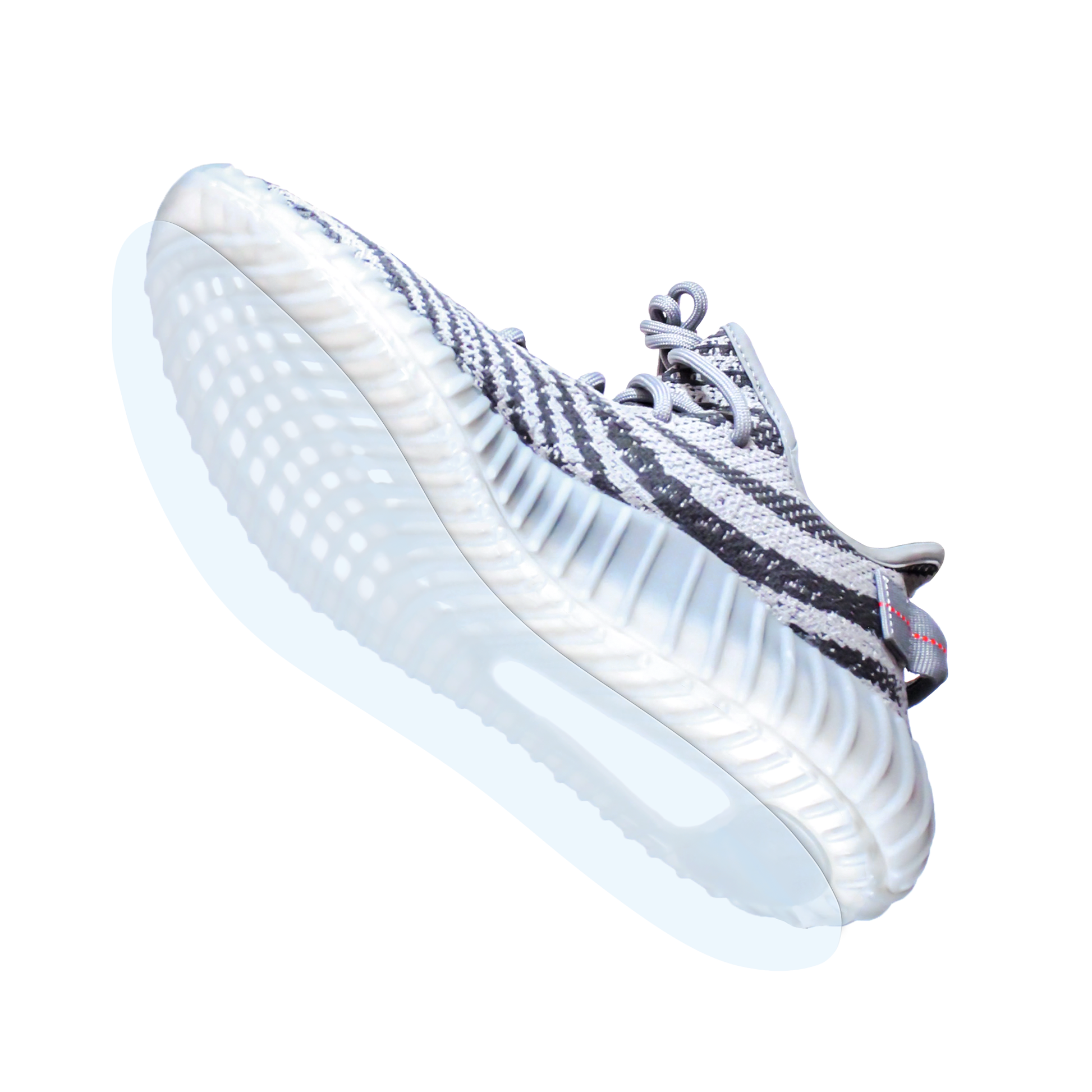 Protect your gray and white Yeezy Boost 350s with the Yeezy Boost 350 Sole Guard—ideal for maintaining the striped pattern and keeping the soles fresh while highlighting your style.