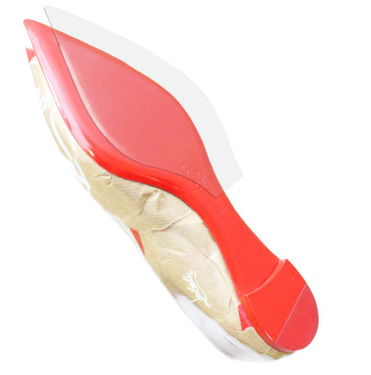 A red-soled high heel, partially wrapped in brown paper, showcases Christian Louboutin's iconic design. Its elegant silhouette hints at hidden surprises like a Sole Guard from the Christian Louboutin Flats Sole Guard 3 Pack for added style and longevity.