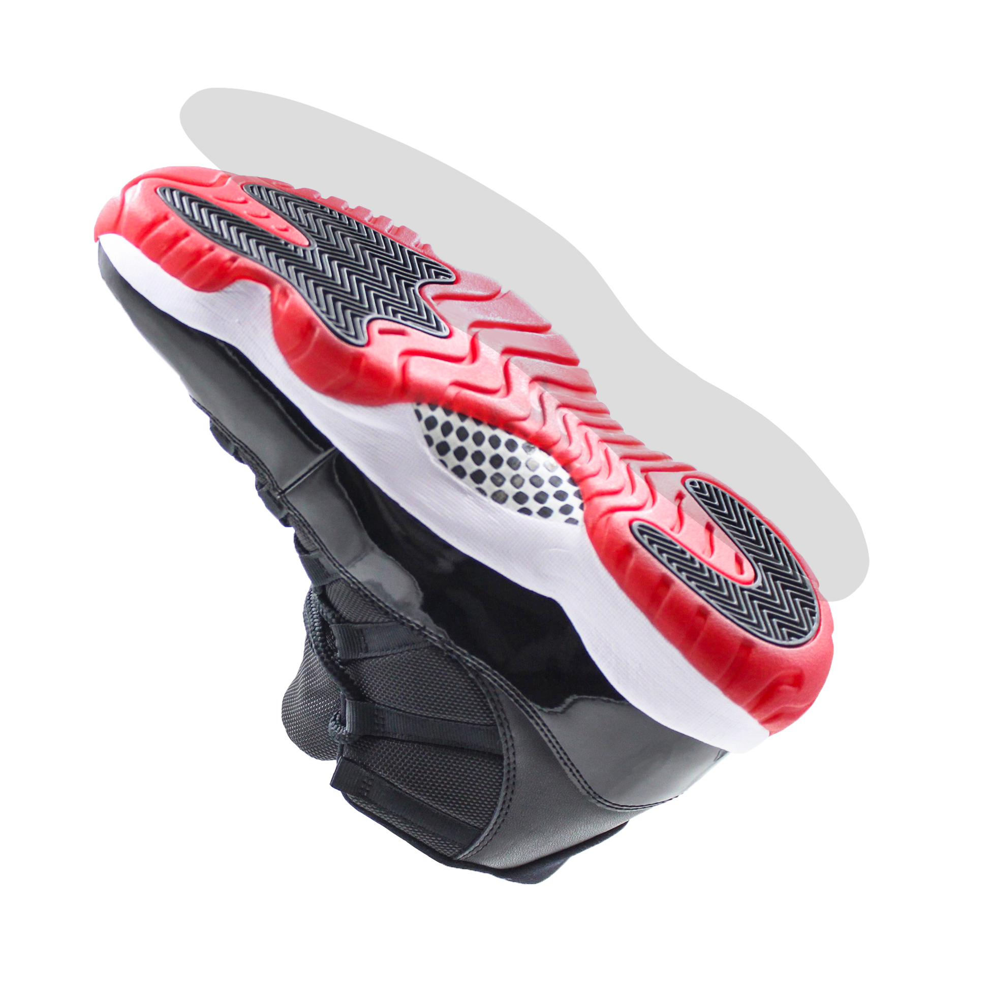 The Jordan 11 Sole Guard is a black and red athletic shoe designed for sneaker preservation, featuring a distinctive wavy sole pattern. Shown from the bottom angle, it's ideal for those who value both style and functionality.