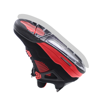 Black and red athletic shoe from below, highlighting the sole design with Jordan 4 Sole Guard flair.