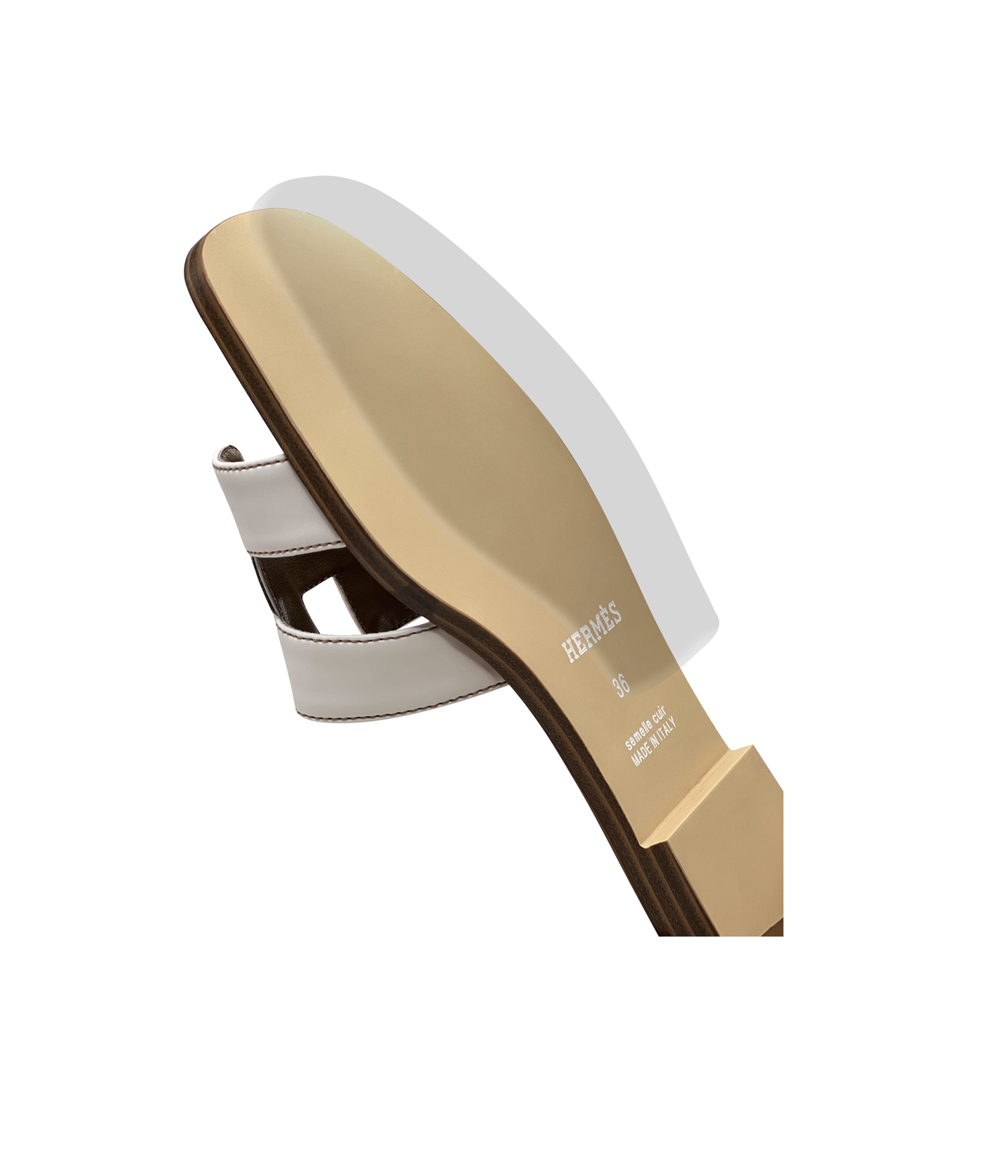 Close-up of the beige Hermès Oran sandal with white straps, highlighting the sole's size and logo, featuring a Sole Guard from the Hermès Oran Sandal Sole Guard 3 Pack for extra protection.