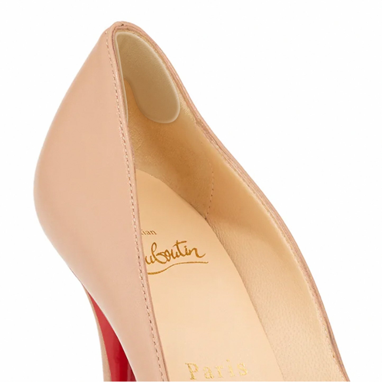 Close-up of the Heel Liner, a nude high-heeled shoe with a transparent design and iconic red sole, viewed from the back right angle.