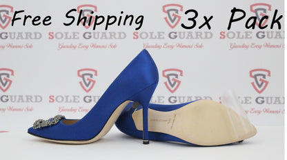 Two blue high heels are elegantly displayed, highlighting the "Manolo Blahnik Sole Guard 3 Pack" for free shipping. Enhance shoe preservation and style effortlessly with these beauties.